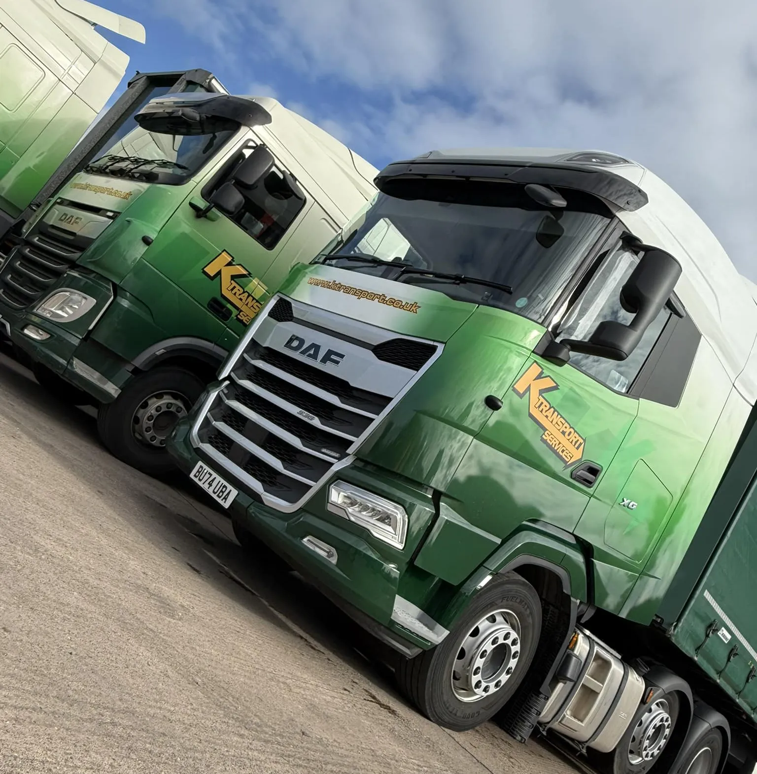 Finished DAF lorry cabs fitted with Mobad vehicle graphics