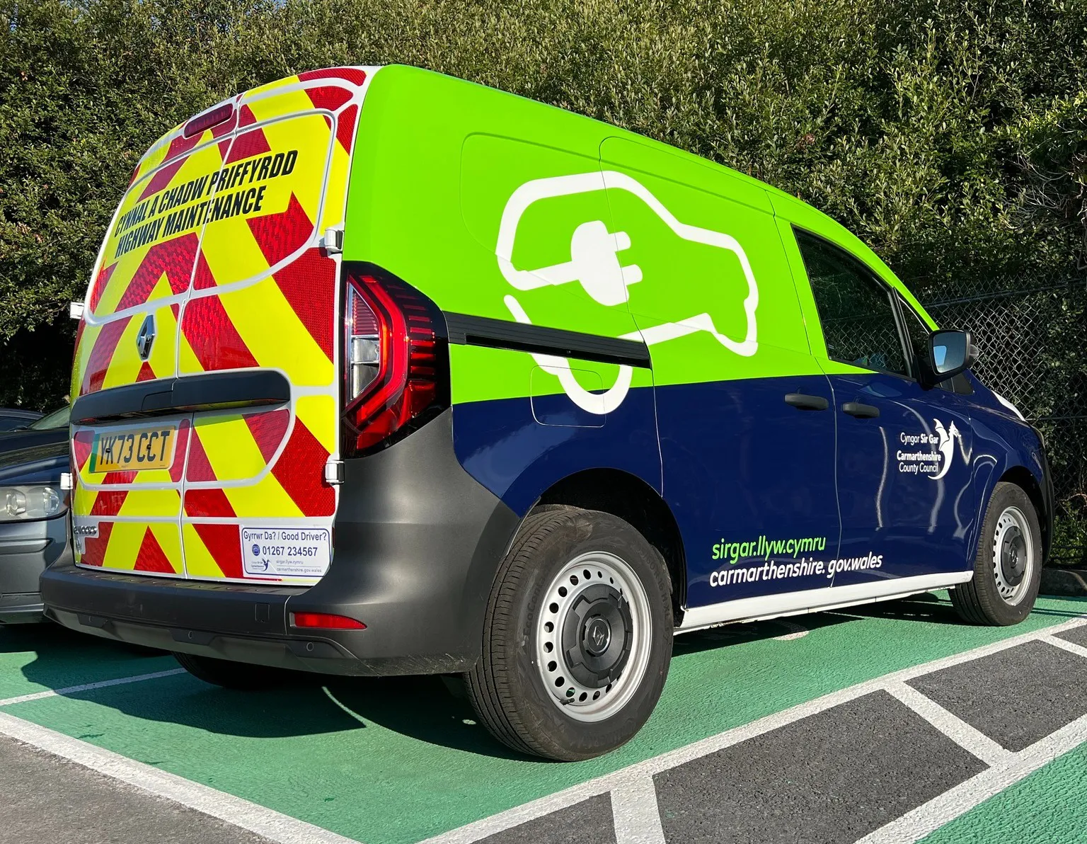 Carmartheshire county council electric vehicle with finished Mobad graphics